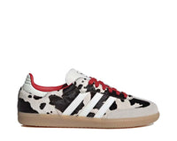 Scarpe da ginnastica basse in pelle con motivo mucca per donna